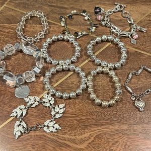 10 bracelets (silver, white, clear)